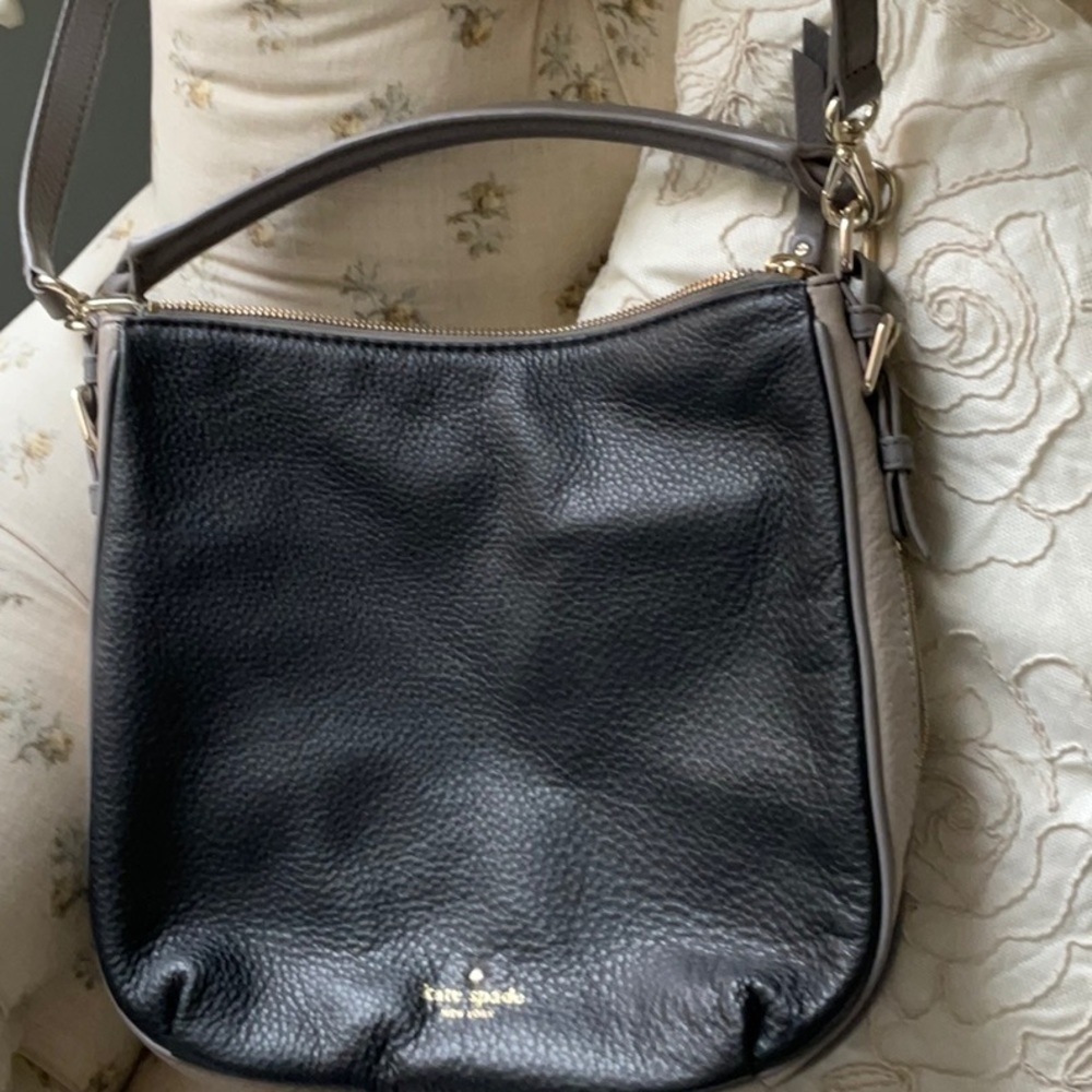 Two Toned Crossbody with expanding ability, two leather straps, zippered top